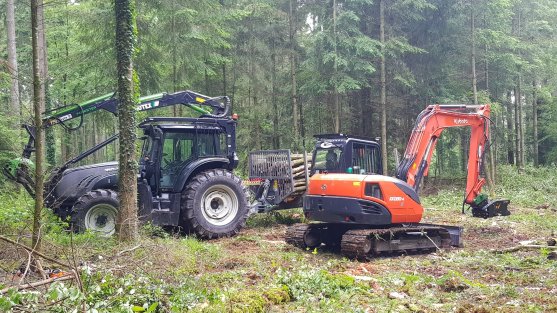 Valtra forestry tractor with 'treedig' forestry excavator .jpg